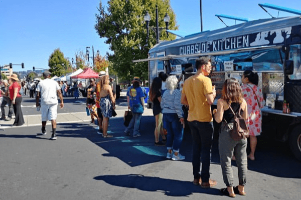 People lining up for Curbside Kitchen at Spirit & Soul Festival 2019